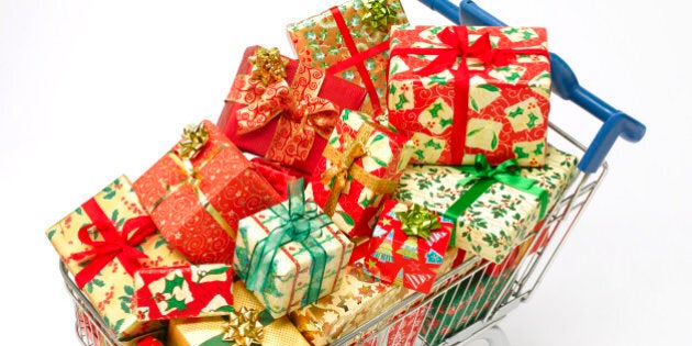 Supermarket trolley filled with christmas presents