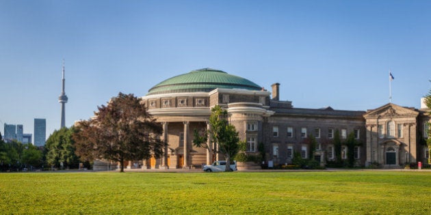 The Convocation Hall of the University of Toronto; CN Tower in distance