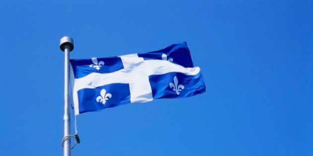 Quebecois Flag Billowing in the Blue Sky