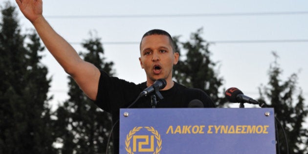 THERMOPYLAE, GREECE - SEPTEMBER 03: Ilias Kassidiaris, lawmaker of the Golden Dawn party, addresses supporters in front of the King Leonidas monument during the event to commemorate the fallen of the battle of Thermopylae on September 3, 2016 in Thermopylae, Greece. (Photo by Nicolas Koutsokostas/Cobis via Getty Images)