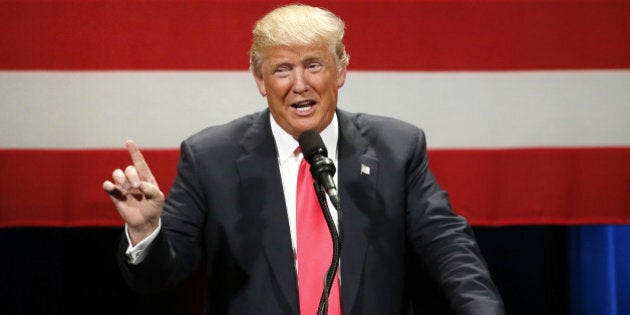 Republican presidential candidate Donald Trump addresses the crowd during a rally at the Milwaukee Theatre Monday, April 4, 2016, in Milwaukee. (AP Photo/Charles Rex Arbogast)