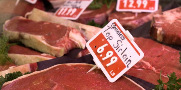 Display of fresh raw meats at deli