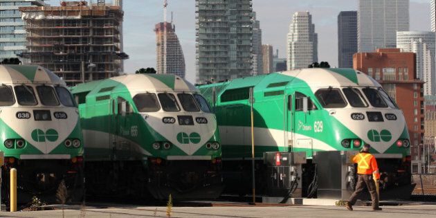 TORONTO, ON - NOVEMBER 14: Transportation minister Bob Chiarelli and Bruce McCuaig from Metrolinx announce that GO Transit will refund fares on trains that are 15 minutes late. The announcement was made at the Don Yards in Toronto. (Steve Russell/Toronto Star via Getty Images)