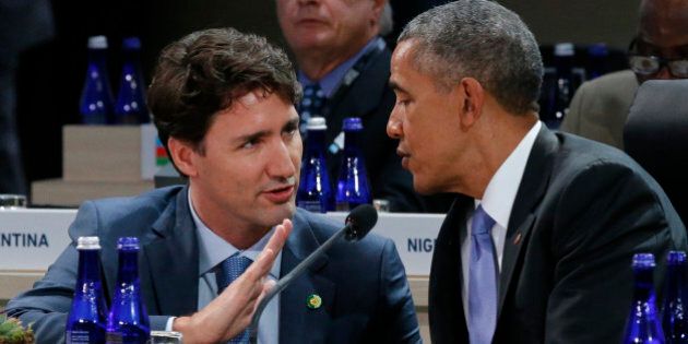 Canada's Prime Minister Justin Trudeau (L) speaks with U.S. President Barack Obama after the start of the second and final plenary session of the Nuclear Security Summit in Washington April 1, 2016. REUTERS/Jonathan Ernst