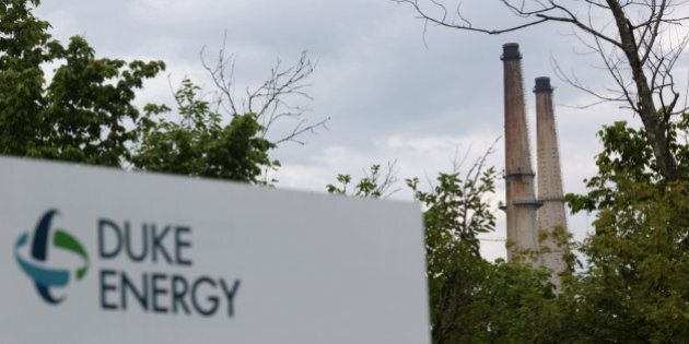 Signage stands outside the Duke Energy Corp. Gallagher Station power plant in New Albany, Indiana, U.S., on Monday, July 27, 2015. Coal reclaimed its ranking as the top fuel for generating electricity at U.S. power plants in May, beating natural gas, which took the number one spot for the first time in April. Photographer: Luke Sharrett/Bloomberg via Getty Images