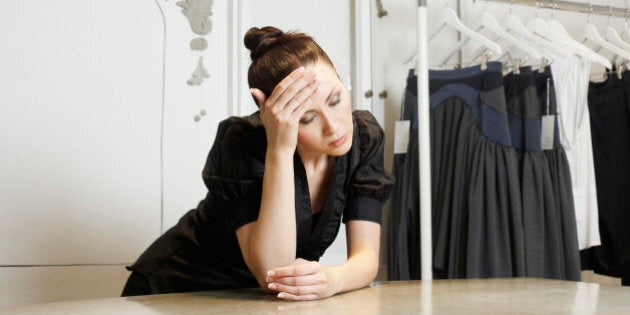 Woman Leaning on Table