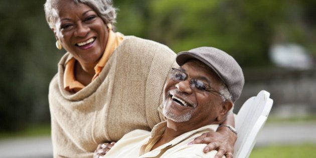 Portrait of stylish senior African American couple. Focus on man (60s).