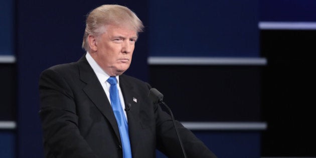 HEMPSTEAD, NY - SEPTEMBER 26: Republican presidential nominee Donald Trump looks on during the Presidential Debate at Hofstra University on September 26, 2016 in Hempstead, New York. The first of four debates for the 2016 Election, three Presidential and one Vice Presidential, is moderated by NBC's Lester Holt. (Photo by Drew Angerer/Getty Images)