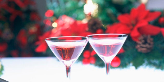 Cocktails on table with plate, knife and forks