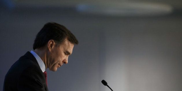 William 'Bill' Morneau, Canada's finance minister, pauses while speaking at the Toronto Region Board of Trade in Toronto, Ontario, Canada, on Friday, Oct. 28, 2016. Morneau is defending his recent spate of mortgage rule changes designed to tighten the housing market, saying he's concerned about household debt levels. Photographer: Cole Burston/Bloomberg via Getty Images