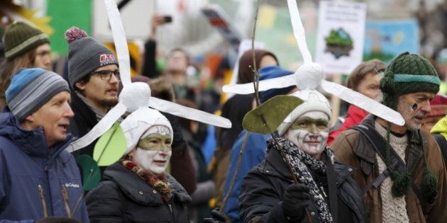 Protesters take part in a rally held the day before the start of the 2015 Paris Climate Change Conference (COP21), in Ottawa, Canada, November 29, 2015. REUTERS/Chris Wattie