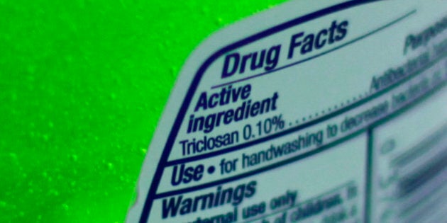 FILE - This Tuesday, April 30, 2013 file photo shows the label of a bottle of antibacterial soap in a kitchen in Chicago. The U.S. government is banning more than a dozen chemicals, including triclosan, long-used in antibacterial soaps and washes, saying manufacturers have failed to show that they are safe and prevent the spread of germs. (AP Photo/Kiichiro Sato)