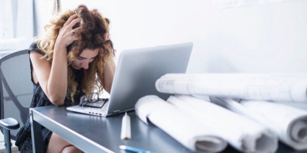 Upset woman in office