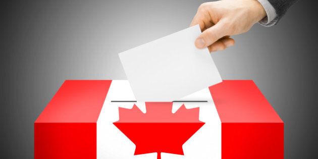 Voting concept - Ballot box painted into national flag colors - Canada