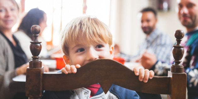 An Italian family gathers around the table to celebrate Christmas at home.