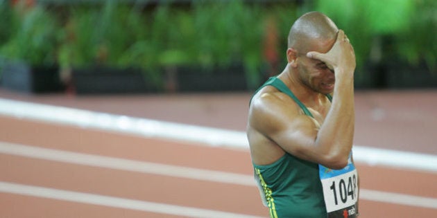 (AUSTRALIA & NEW ZEALAND OUT) Commonwealth Games 2006. Australia's Patrick Johnson after finishing in fourth place in the Men's 200m final during the Athletics Competition at the Melbourne Commonwealth Games, 23 March 2006. NCH Picture by DARREN PATEMAN (Photo by Fairfax Media via Getty Images)