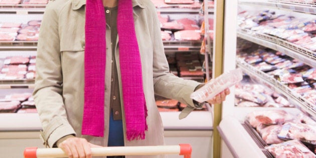 Woman shopping in a supermarket