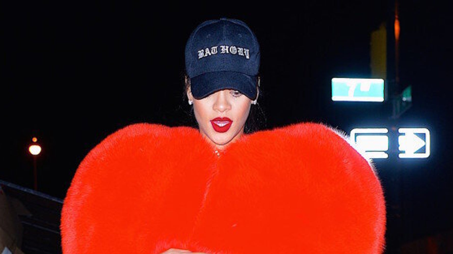 Rihanna Wears A $22,000 Fur Heart Jacket To Feed Birds In New York City