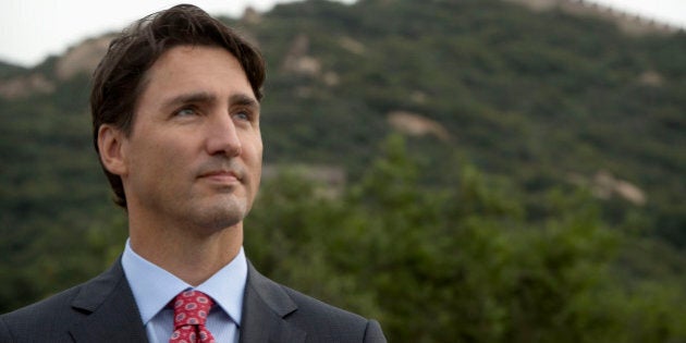 Canada's Prime Minster Justin Trudeau stands on the Badaling section of the Great Wall in Beijing, China, Thursday, Sept. 1, 2016. (AP Photo/Mark Schiefelbein)