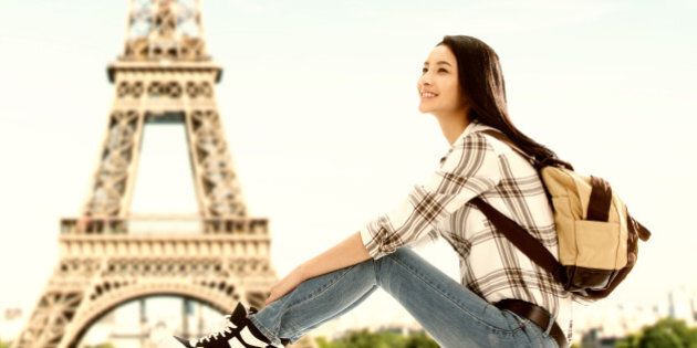 Young woman traveling in Paris France