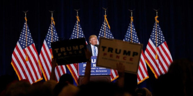 Republican presidential nominee Donald Trump speaks at a campaign rally in Phoenix, Arizona, U.S., August 31, 2016. REUTERS/Carlo Allegri TPX IMAGES OF THE DAY