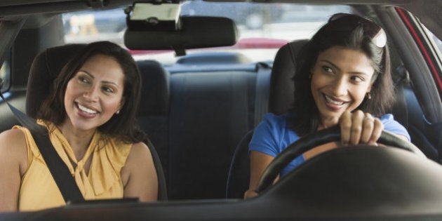 Friends driving in car together