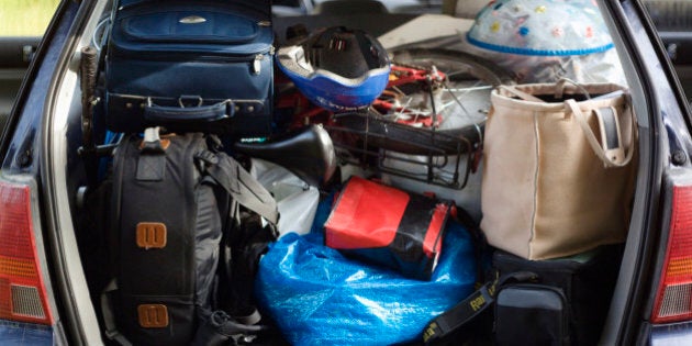 A packed trunk on a car.