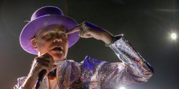TORONTO, ON - AUG. 10: Gord Downie of The Tragically Hip performing at the Air Canada Centre in Toronto as part of the band's Man Machine Poem tour. (Marcus Oleniuk/Toronto Star via Getty Images)
