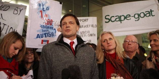 LONDON, ENGLAND - JANUARY 28: Dr Andrew Wakefield (C) stands with his wife Carmel as he talks to reporters at the General Medical Council (GMC) on January 28, 2010 in London, England. Dr Wakefield was the first clinician to suggest a link between autism in children and the triple vaccination for measles, mumps and rubella known as MMR. Today's GMC ruling states that he had acted 'dishonestly and irresponsibly' in carrying out his research. Vaccination take up rates dropped dramatically after Dr Wakefield's research was published in 1998. (Photo by Peter Macdiarmid/Getty Images)