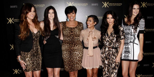 From left, Khloe Kardashian, Kylie Jenner, Kris Jenner, Kourtney Kardashian, Kim Kardashian, and Kendall Jenner pose together at the Kardashian Kollection launch party in Los Angeles, Wednesday, Aug. 17, 2011. The Kardashian Kollection designed by the Kardashian sisters is available at Sears. (AP Photo/Matt Sayles)