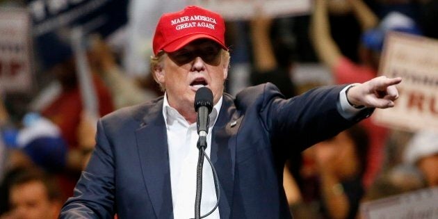 Republican presidential candidate Donald Trump speaks during a campaign rally Saturday, March 19, 2016, in Tucson, Ariz. (AP Photo/Ross D. Franklin)