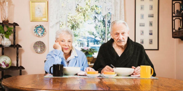 Senior couple at breakfast table