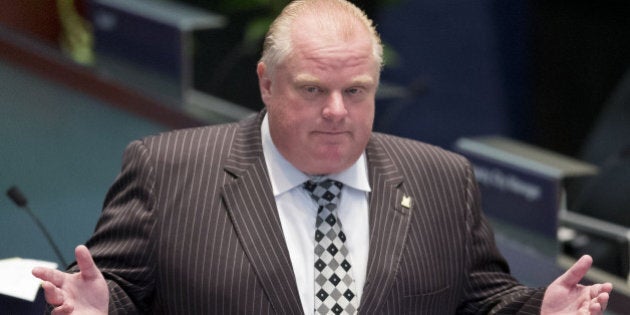 TORONTO, ON- AUGUST 25: Mayor Rob Ford was inside council chambers Monday morning. Toronto City Hall saw a boost of colour on Monday after a group of councillors wore pink to celebrate their last council session before the election and to protest against Rob Fords performance as mayor. August 25, 2014. (Lucas Oleniuk/Toronto Star via Getty Images)