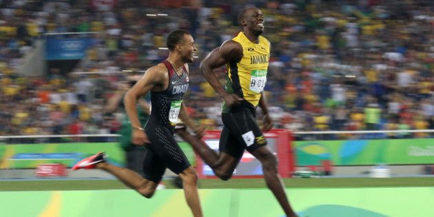 RIO DE JANEIRO, BRAZIL - AUGUST 17: Andre De Grasse of Canada and Usain Bolt of Jamaica compete in the Men's 200m on day 12 of the Rio 2016 Olympic Games at Olympic Stadium on August 17, 2016 in Rio de Janeiro, Brazil. (Photo by Jean Catuffe/Getty Images)