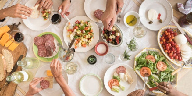 USA, New Jersey, Jersey City, Friends having dinner together