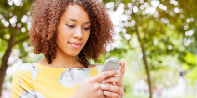 Young woman using smart phone