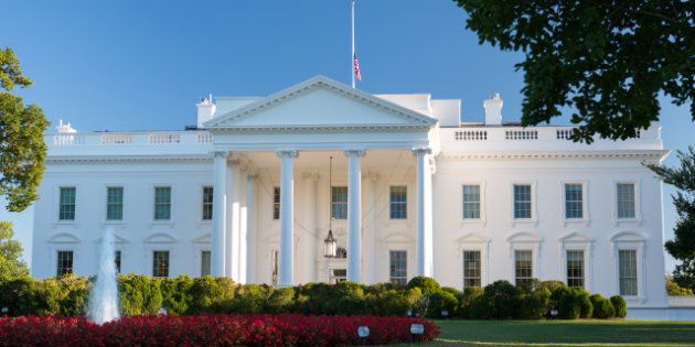 U.S. Flag flies at half-staff at the White House and all Federal facilities due to the Navy Yard shooting on September 16, 2013.