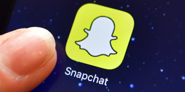 LONDON, ENGLAND - AUGUST 03: A finger is posed next to the Snapchat app logo on an iPad on August 3, 2016 in London, England. (Photo by Carl Court/Getty Images)