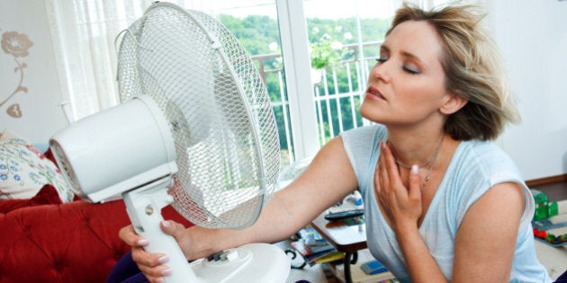 woman cooling herself