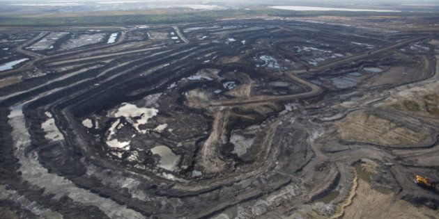 Expansive aerial view of a pit mining project in Alberta's Oilsands near Fort McMurray.