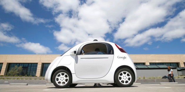 FILE - In this May 13, 2015, file photo, Google's new self-driving prototype car is presented during a demonstration at the Google campus in Mountain View, Calif. Federal transportation officials say they are updating their position on self-driving cars, with a goal of getting the emerging technology into the publicâs hands sooner than later. (AP Photo/Tony Avelar, File)