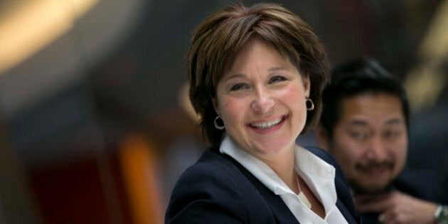 Christy Clark, premier of British Columbia, smiles during an interview in New York, U.S., on Wednesday, Dec. 10, 2014. Canada's ambition to become a top LNG exporter is on track even with oil's plunge as investment decisions on two mega-projects are set to come next year, Clark said. Photographer: Scott Eells/Bloomberg via Getty Images