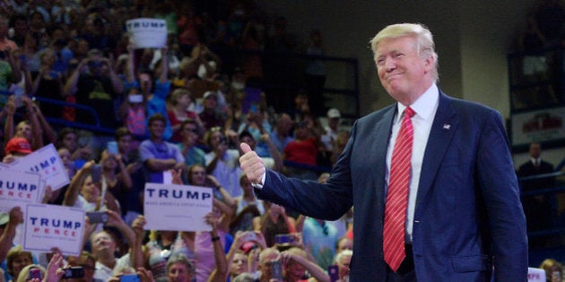 WILMINGTON, NC - AUGUST 9: Republican presidential candidate Donald Trump thumbs-up the crowd during a campaign event at Trask Coliseum on August 9, 2016 in Wilmington, North Carolina. This was Trump's first visit to Southeastern North Carolina since he entered the presidential race. (Photo by Sara D. Davis/Getty Images)