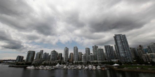 Residential and commercial buildings are pictured in Vancouver, British Columbia June 20, 2011. Canadian Finance Minister Jim Flaherty said on Monday he continues to monitor the country's housing market, which has some