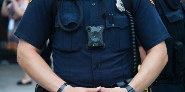 A police officer wears a body camera on during an anti-Donald Trump protest in Cleveland, Ohio, near the Republican National Convention site July 18, 2016.The Republican Party opened its national convention Monday, kicking off a four-day political jamboree that will anoint billionaire Donald Trump as its presidential nominee. / AFP / JIM WATSON (Photo credit should read JIM WATSON/AFP/Getty Images)