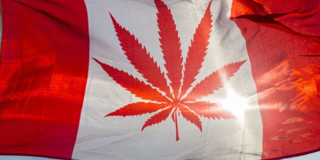 Canadian flag with maple leaf replaced by marijuana leaf.