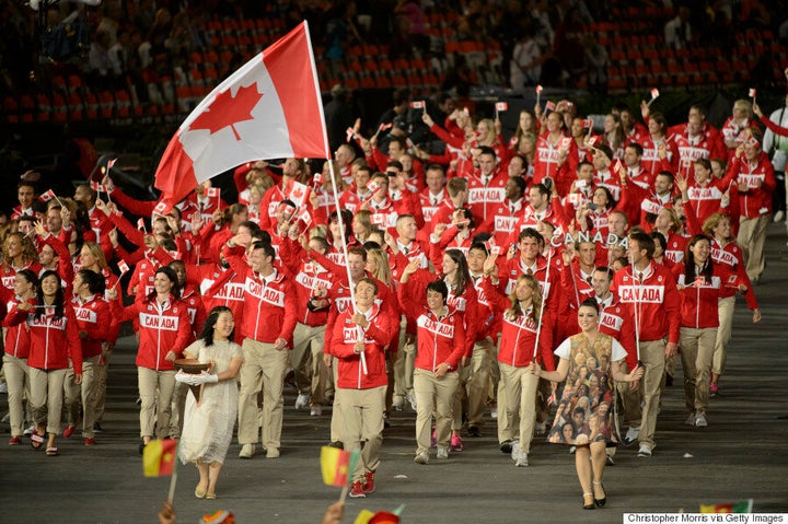 Canadian Olympic Athletes Celebrate in Retro Inspired Red Podium Track Suit  Created by the Hudson's Bay Company