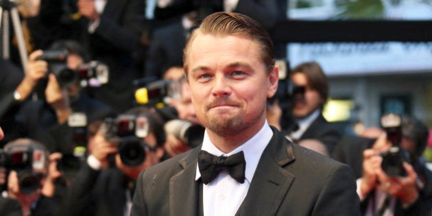 Cast member Leonardo DiCaprio arrives on the red carpet for the screening of the film 'The Great Gatsby' and for the opening ceremony of the 66th Cannes Film Festival in Cannes May 15, 2013. The Cannes Film Festival runs from May 15 to May 26. REUTERS/Regis Duvignau (FRANCE - Tags: ENTERTAINMENT HEADSHOT)