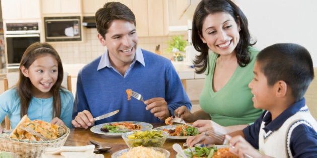 family enjoying meal mealtime...