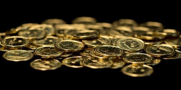 Pile of Canadian one dollar coins. The Canadian one dollar coin, commonly called the 'loonie', is a gold-coloured one-dollar coin. It bears images of a common loon, a bird which is common and well known in Canada. The coin has become the symbol of the Canadian dollar.